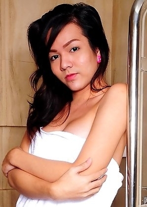 Jhella is a curvy girl with a nice hard tool and soft boobs. In her second shower set she shows her charms and strokes herself.