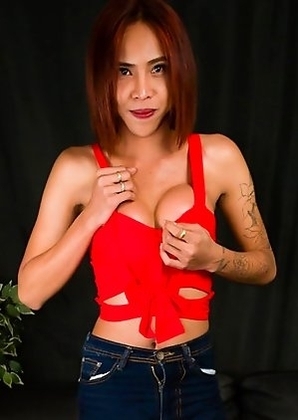 Yoghurt is a horny Bangkok tgirl with a sexy body, big breasts, a great ass and a sexy uncut cock!