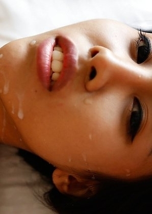 19 year old sweet looking Thai ladyboy Nene takes facial from big white cock