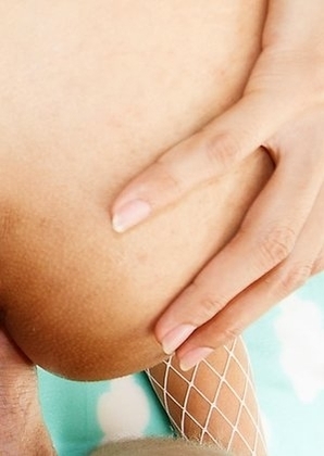 Uma pulls her panties aside and spreads her asshole for the POV and then sits back and lets her cock out of the side