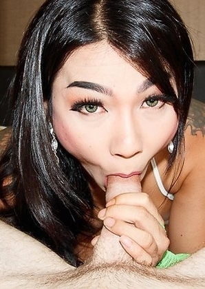 Tata is dressed in a see through bright green bikini with matching mesh arm stockings. This ladyboy knows how hot her body is an starts enticing me ri