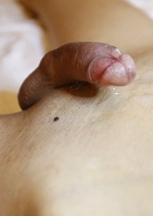 Thai ladyboy Poy gives a pov blowjob to a fat white cock