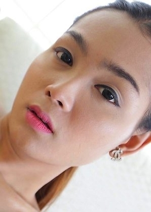 Sexy Thai ladyboy Samy gets load shot all over her by white stud