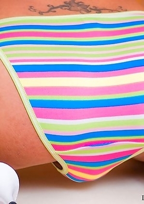 Petite Ladyboy Lee flashes perky soft titties in bikini