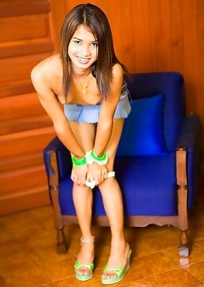 Petite Kathoey Lee topless in a short denim mini skirt