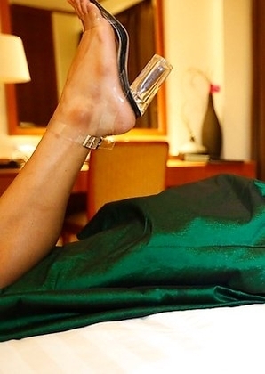 25 year old sexy Thai ladyboy Lily strips down and gets fucked by white cock