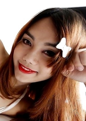 Lovely Thailand ladyboy Ning takes white pipe up the ass