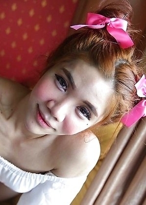 Petite and very feminine Ladyboy Ami lavishes in the luxury of white travelers cock