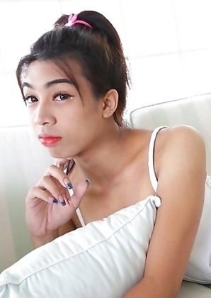 Sexy big-boobed Thai Ladyboy Bam shows huge appetite for cock