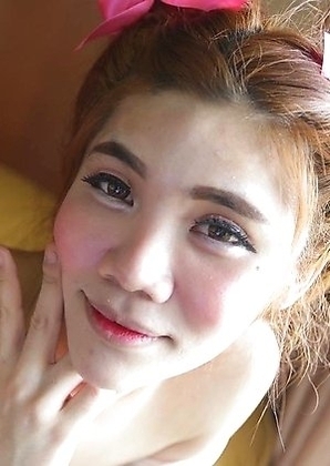 Petite and very feminine Ladyboy Ami lavishes in the luxury of white travelers cock