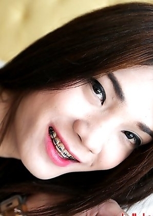 20 year old Thai ladyboy Spor stripping for white tourist