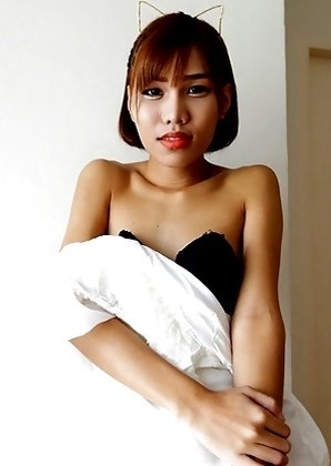 18 year old horny Thai shemale Natty striptease to black panties and hard cock
