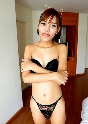 18 year old horny Thai shemale Natty striptease to black panties and hard cock