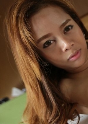 Sexy Thai ladyboy Mond takes a good ass pounding from big white cock