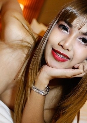 Pretty 26yo Thai ladyboy May gets a mouthful of cum from big white cock