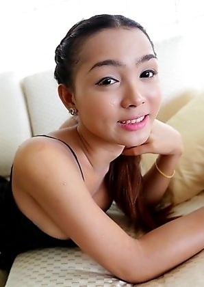 22 year old busty Thai ladyboy Samy gets naked and poses for tourist