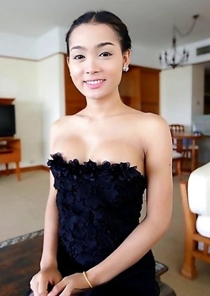 22 year old Thai shemale Samy teases tourist on camera in her black dress
