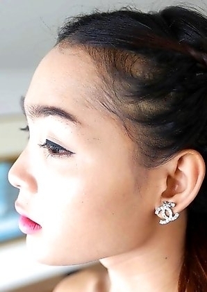 22 year old Thai shemale Samy teases tourist on camera in her black dress