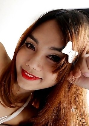 22 year old Thai ladyboy Ning gets made up for her date and a facial from her tourist friend