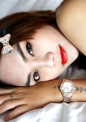 22 year old Thai ladyboy Ning gets made up for her date and a facial from her tourist friend
