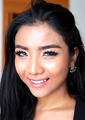 Horny Thai ladyboy Leeya gets covered with cum from white cock