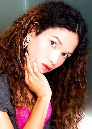 Nokyu is half Thai half Cambodian. She's very skinny and tall, curly hair and noboobs. She has a very nice long uncut cock with precum.